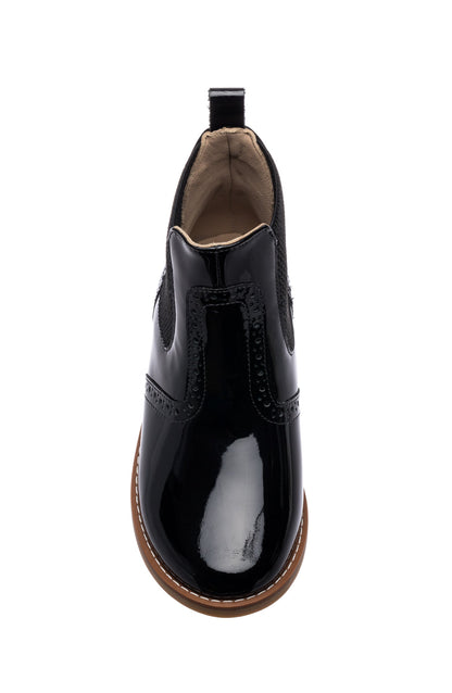 Black patent leather girls' bootie with rounded toe and tan sole trim.