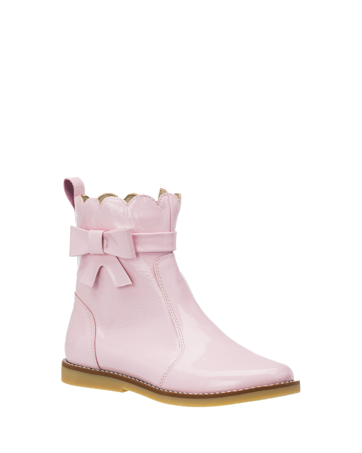 Pink toddler bootie with scalloped top edge, decorative bow, and tan rubber sole.