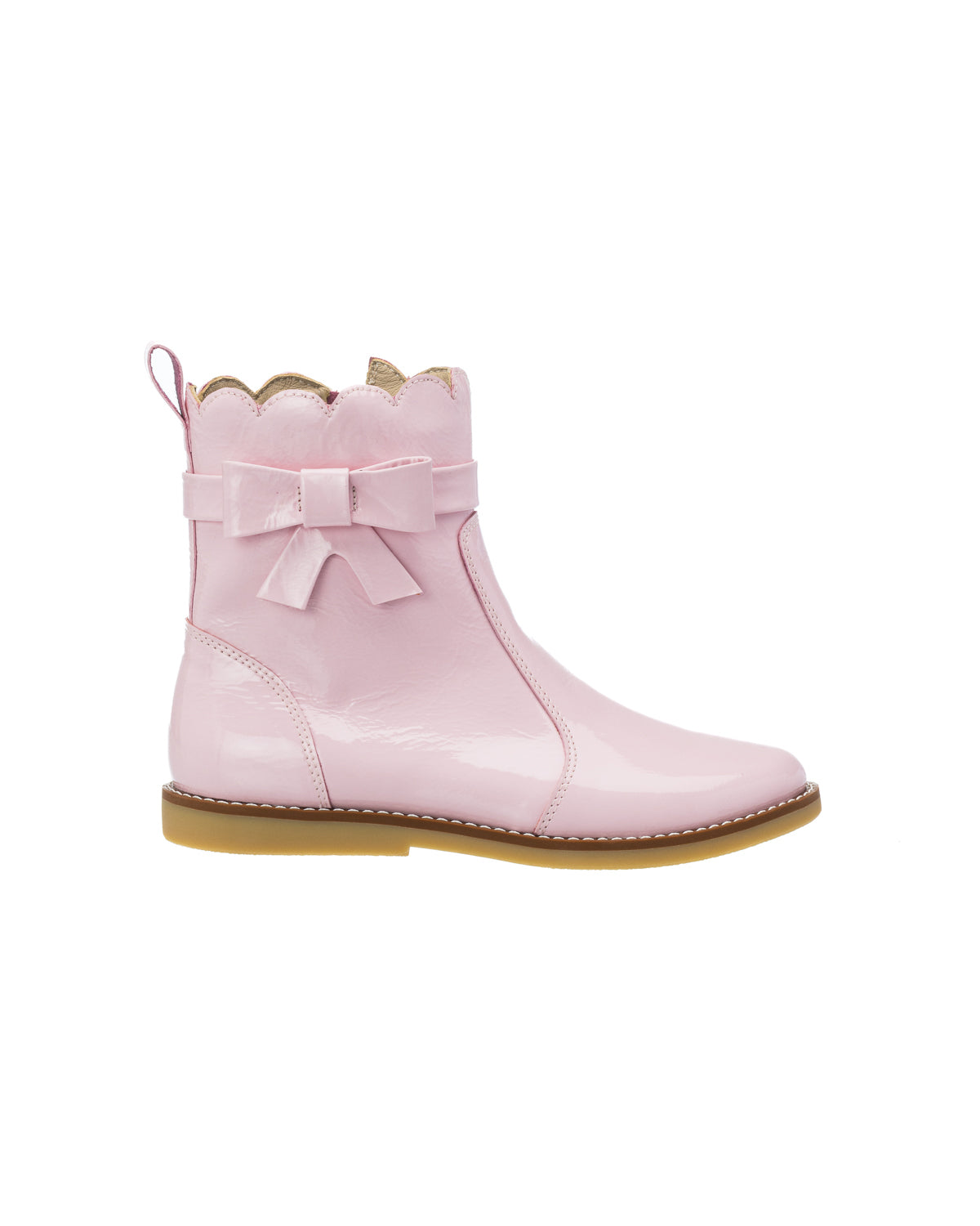 Pink toddler bootie with scalloped top edge, side zipper, and decorative bow on outer side.