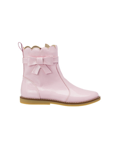 Pink toddler bootie with scalloped top edge, side zipper, and decorative bow on outer side.