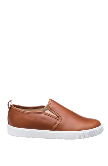 Natural brown leather slip-on shoe for kids with white rubber sole and elastic side panels.