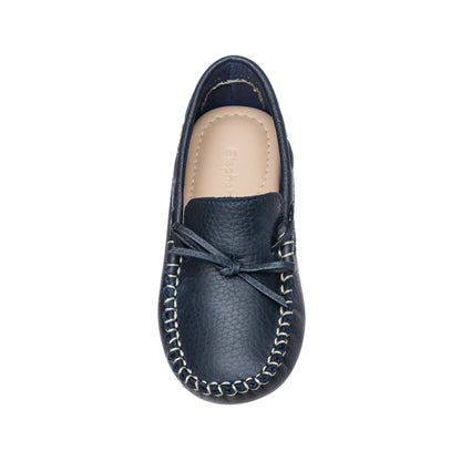 Navy blue leather boys' driver loafer with moccasin-style stitching and bow detail.