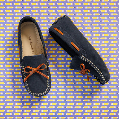 Elephantito - Blue suede boys' driver loafers with orange lace bow and white stitching detailing.