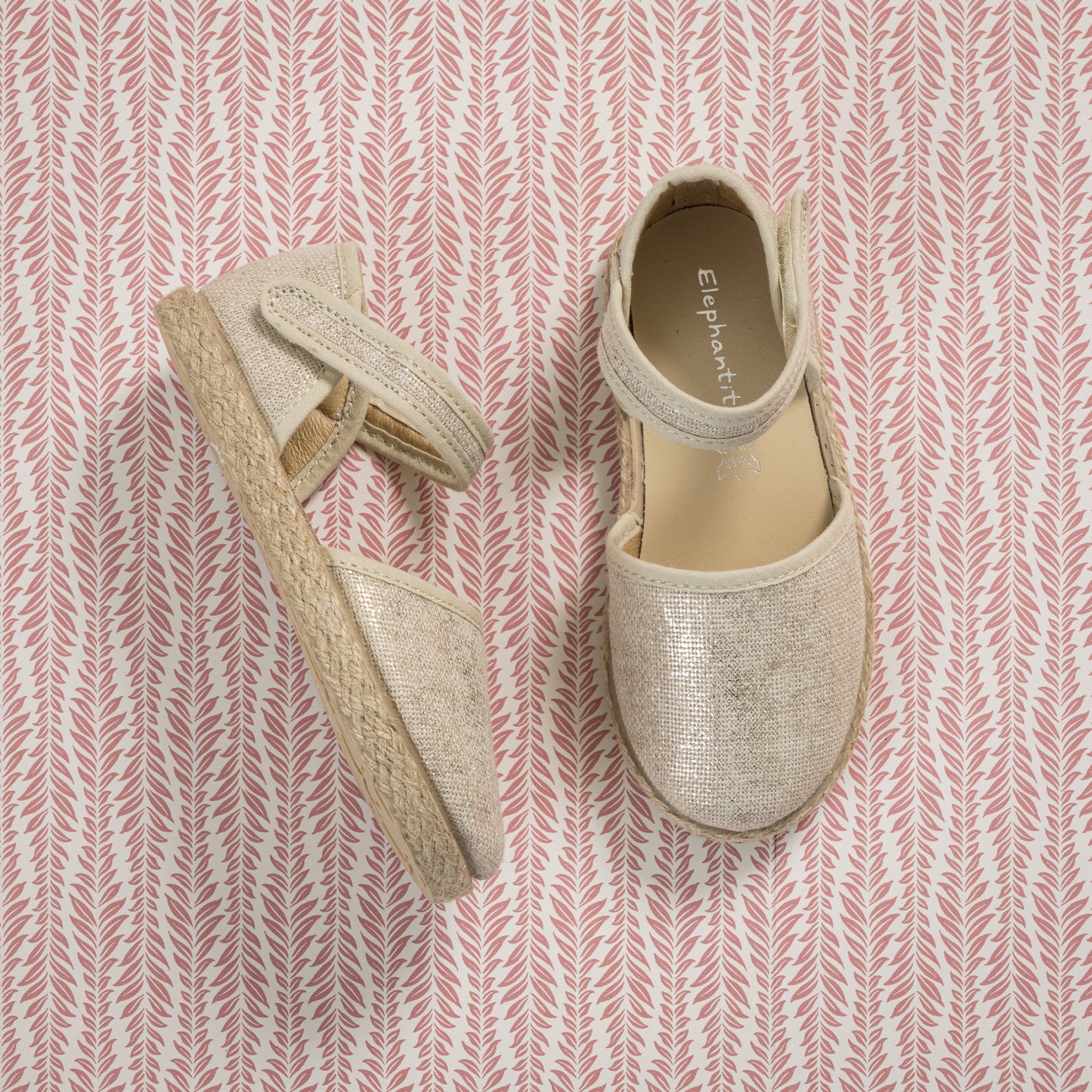 Metallic white linen espadrille with ankle strap and jute sole for toddlers and kids.