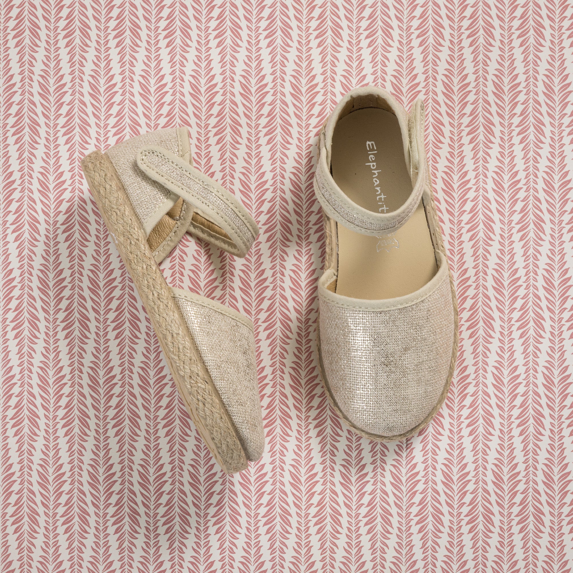 Metallic white linen espadrille with ankle strap and jute sole for toddlers and kids.