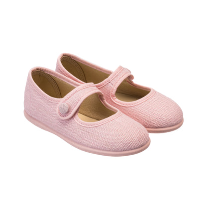 Soft pink linen Mary Jane shoes for toddlers with adjustable strap and button closure.