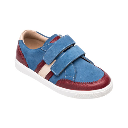 Blue denim boys sneaker with double velcro straps, burgundy and beige accents, and white sole.