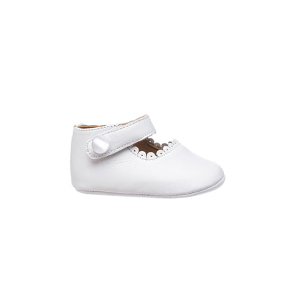 White baby Mary Jane shoe with scalloped edge and single velcro strap closure.