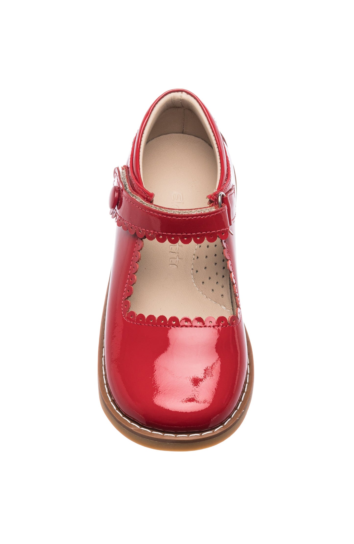 Shiny red patent leather Mary Jane with scalloped edges and buckle strap on tan sole.
