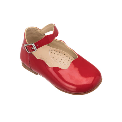 Red patent leather toddler flat with scalloped edge and ankle strap buckle closure.
