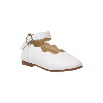 Elephantito - White toddler flat shoe with scalloped edge and ankle strap buckle, tan interior lining.