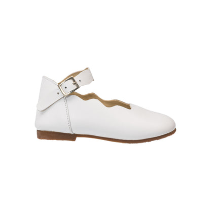 Elephantito - White toddler flat with scalloped edges and ankle strap featuring a silver buckle and brown sole.