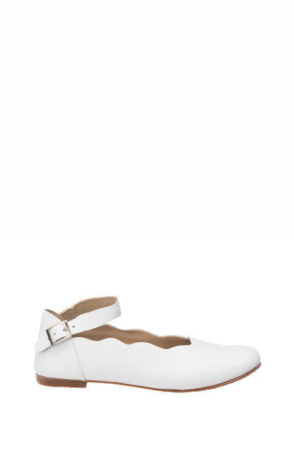 White leather girls' ballet flats with scalloped edging and silver buckle ankle strap.