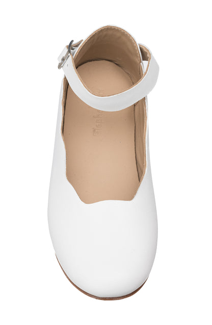 White leather toddler flat with scalloped edge and ankle strap buckle closure.