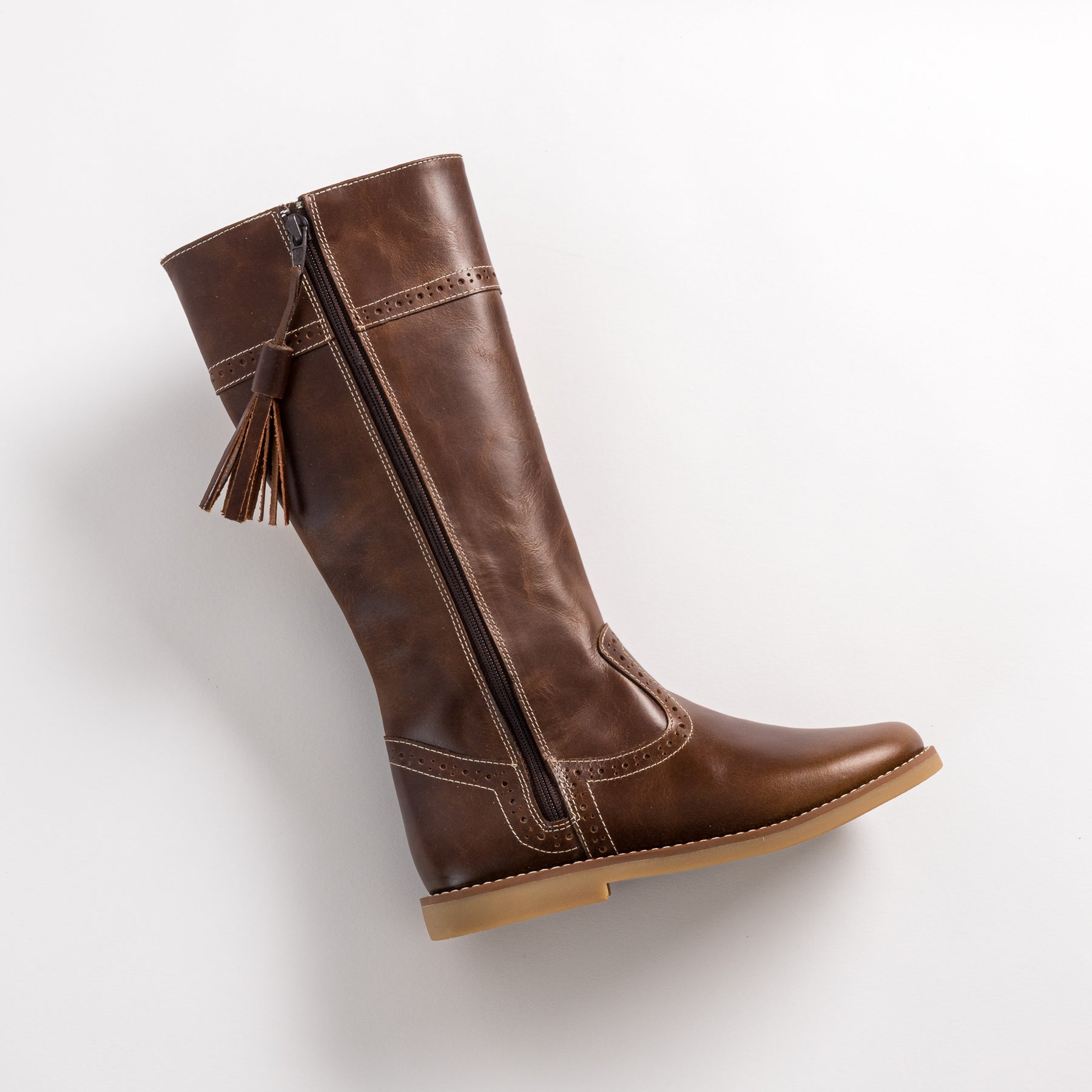 Brown leather toddler riding boot with side zipper and tassel detail, rubber sole.