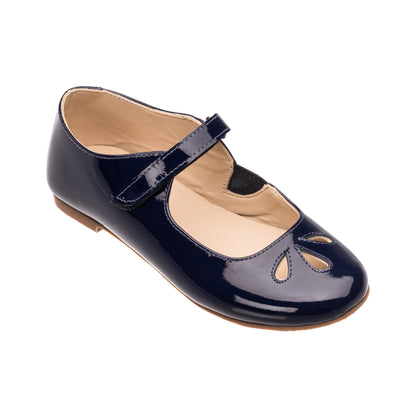 Patent navy blue girls Mary Jane shoe with cutout details and a Velcro strap closure.