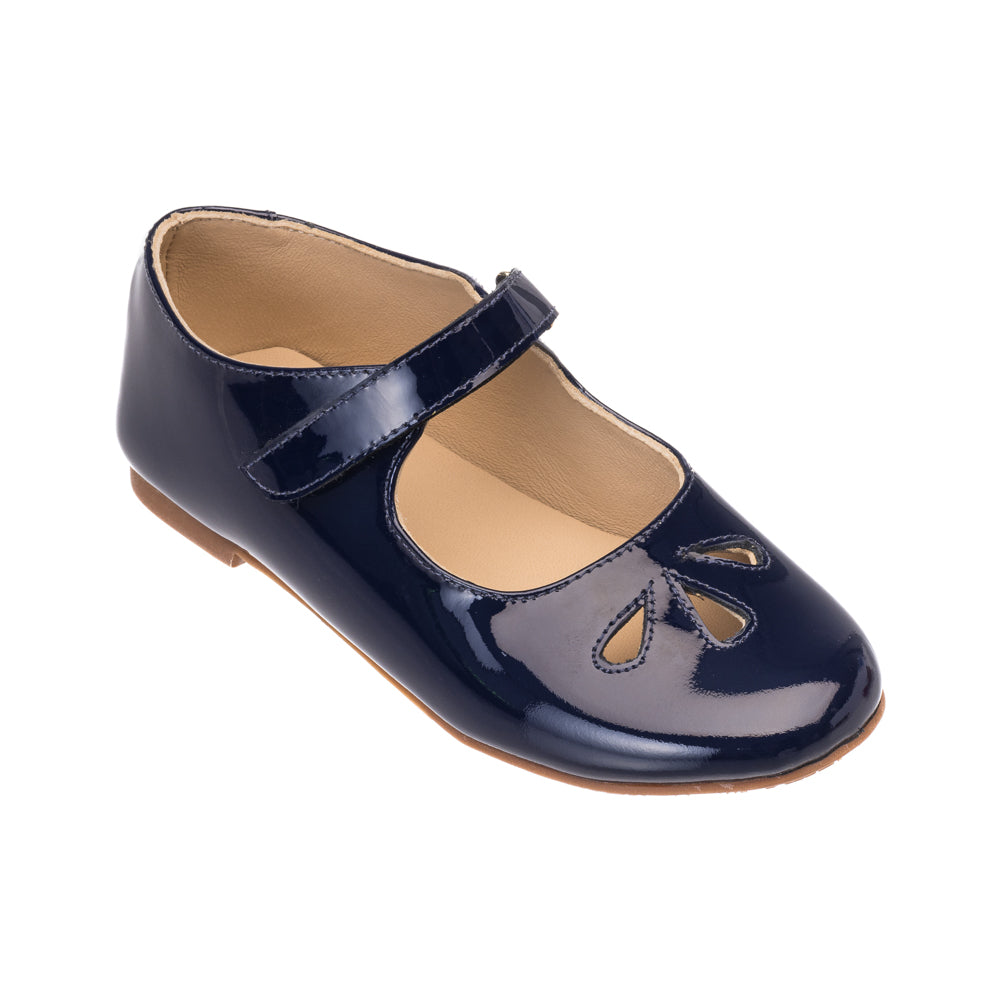Patent navy blue Mary Jane shoe for girls with teardrop cutouts and a velcro strap.