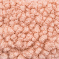 Soft pink shearling fabric with a curly, plush texture for children's shoes.