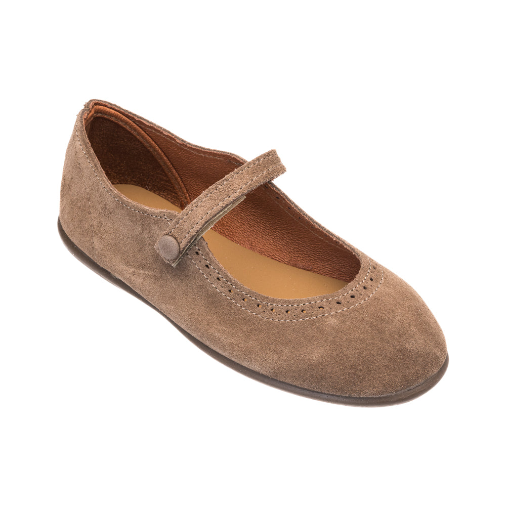 Beige suede Mary Jane shoe with buttoned strap and perforated detailing on toe for children.