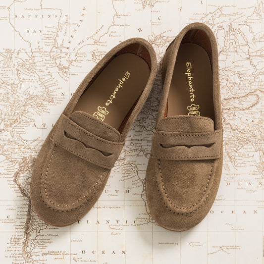 Toffee brown suede penny loafers for boys with stitched detailing and a moccasin-style toe.