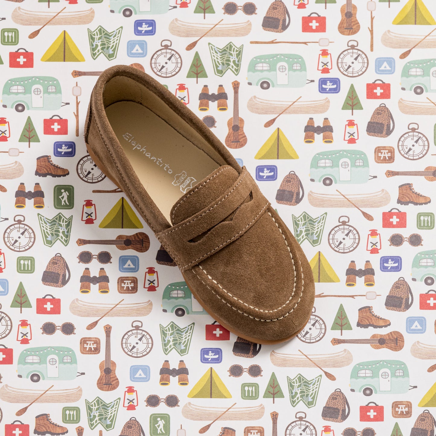 Toffee brown suede penny loafer for toddlers with stitched detailing and classic moccasin design.