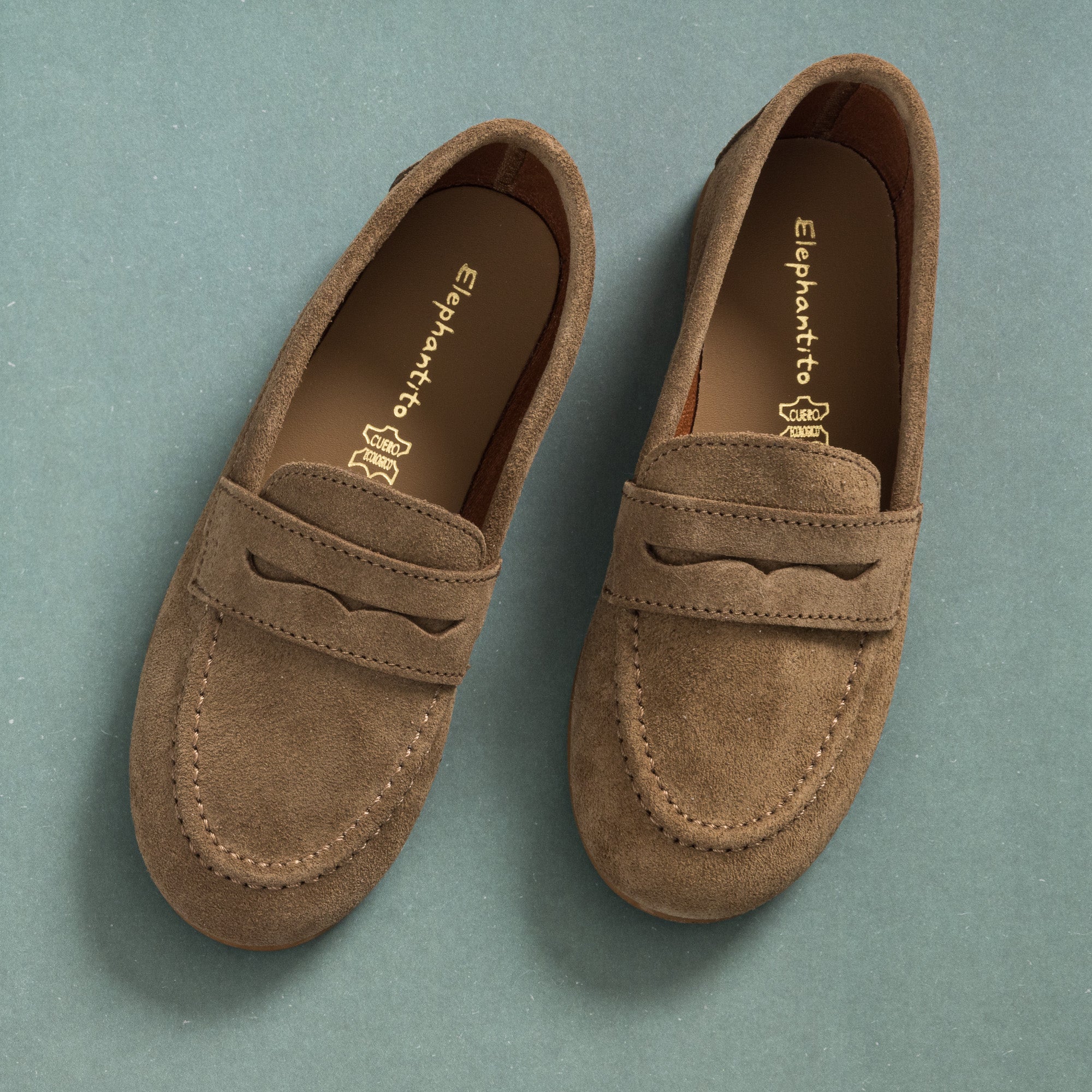 Toffee brown suede penny loafers for boys with stitched detailing and leather lining.