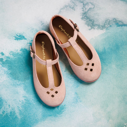 Pink toddler suede T-bar shoes with diamond cutout details and adjustable buckle straps.