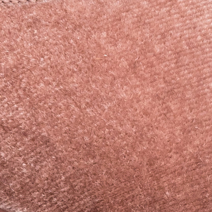 Soft pink velvet fabric with a plush, textured surface for children's shoes.
