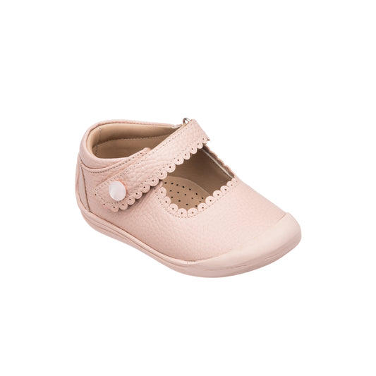 Pink toddler Mary Jane shoe with scalloped edges and button strap closure.