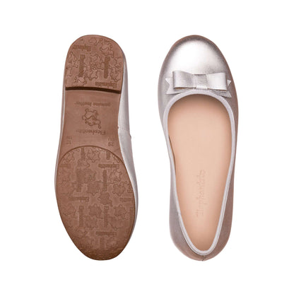 Silver ballet flats for girls with a small bow and cushioned insole, textured rubber sole.