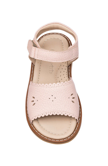 Pink toddler sandal with scalloped edges and flower cutout on front strap, adjustable ankle strap.