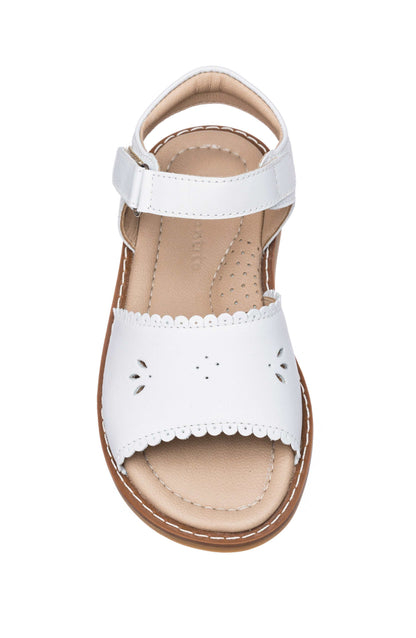White leather toddler sandal with scalloped edges and floral cutout details.