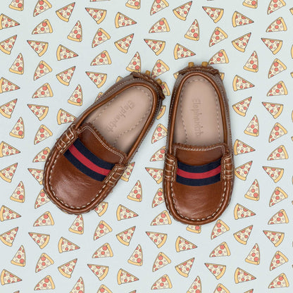 Natural brown toddler loafers with red and navy striped fabric detail and stitched edges.
