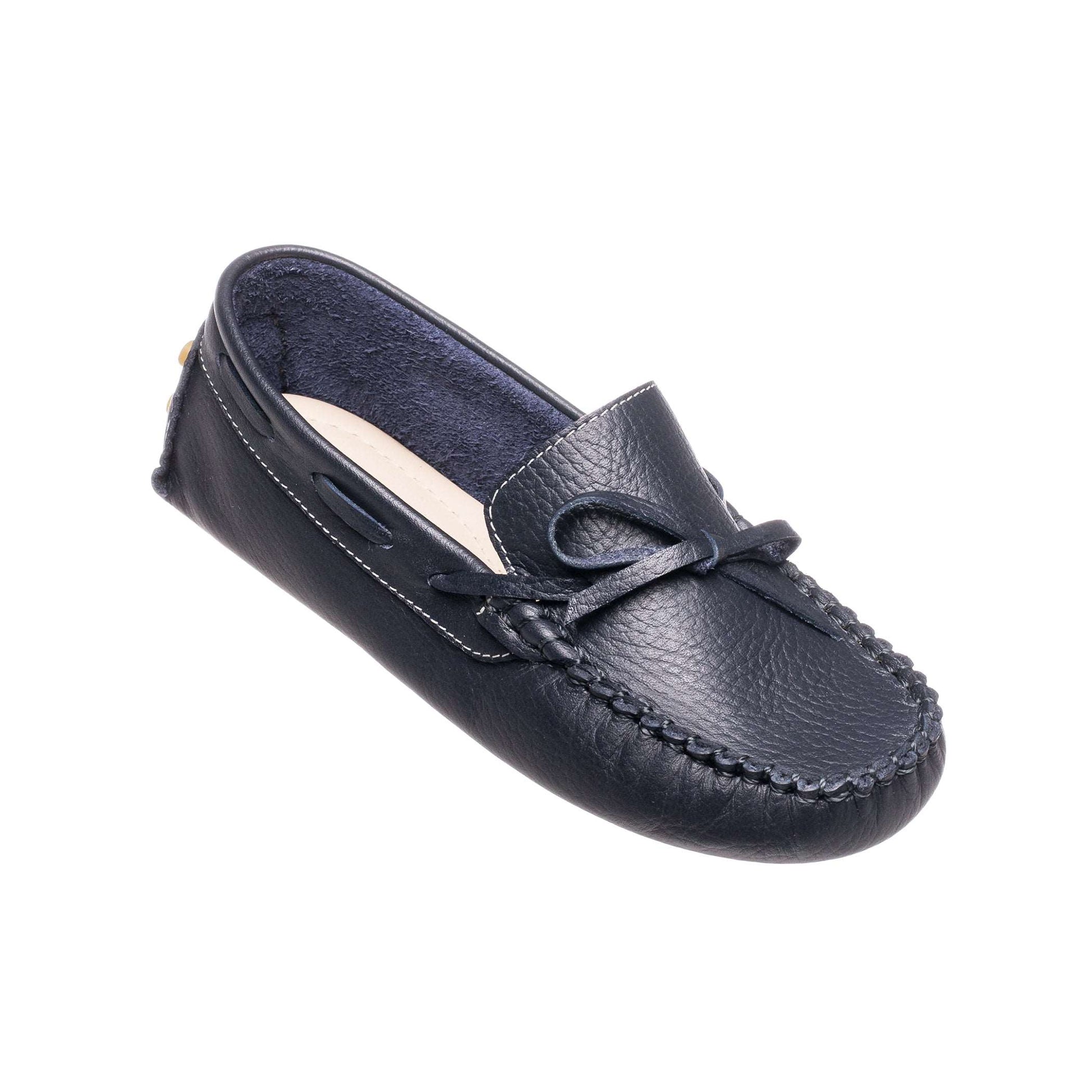 Navy blue toddler driver loafer with bow detail and textured leather upper.