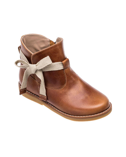 Brown leather toddler bootie with beige bow detail and tan sole.