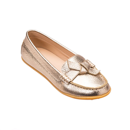 Metallic gold moccasin shoe with textured leather, rounded toe, and decorative bow on top.